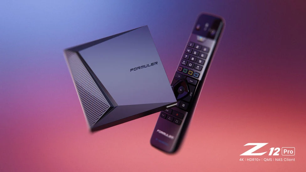 Formuler Z12 Pro with its remote on a coloured background.